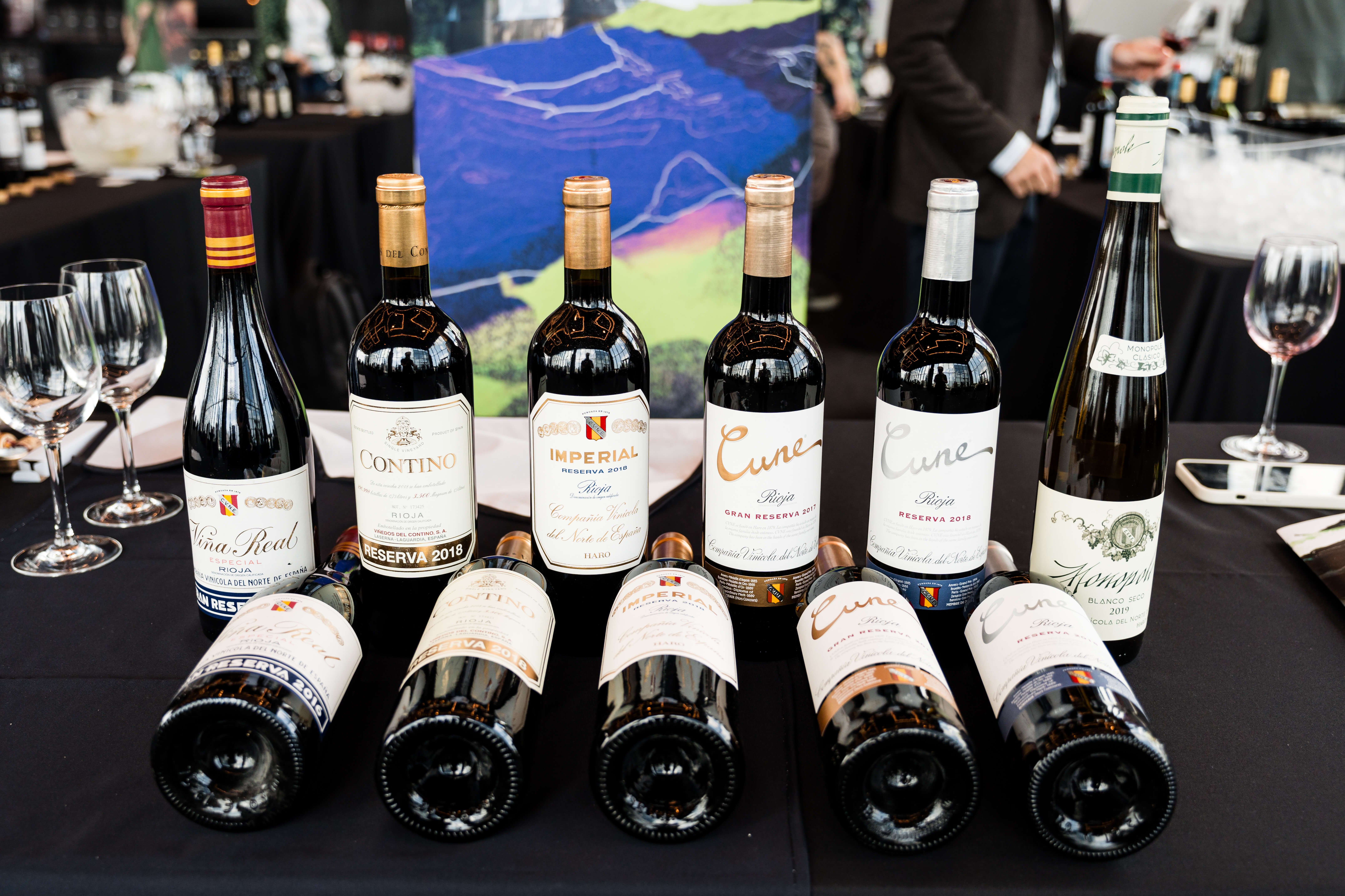 a display of several bottles of red wine